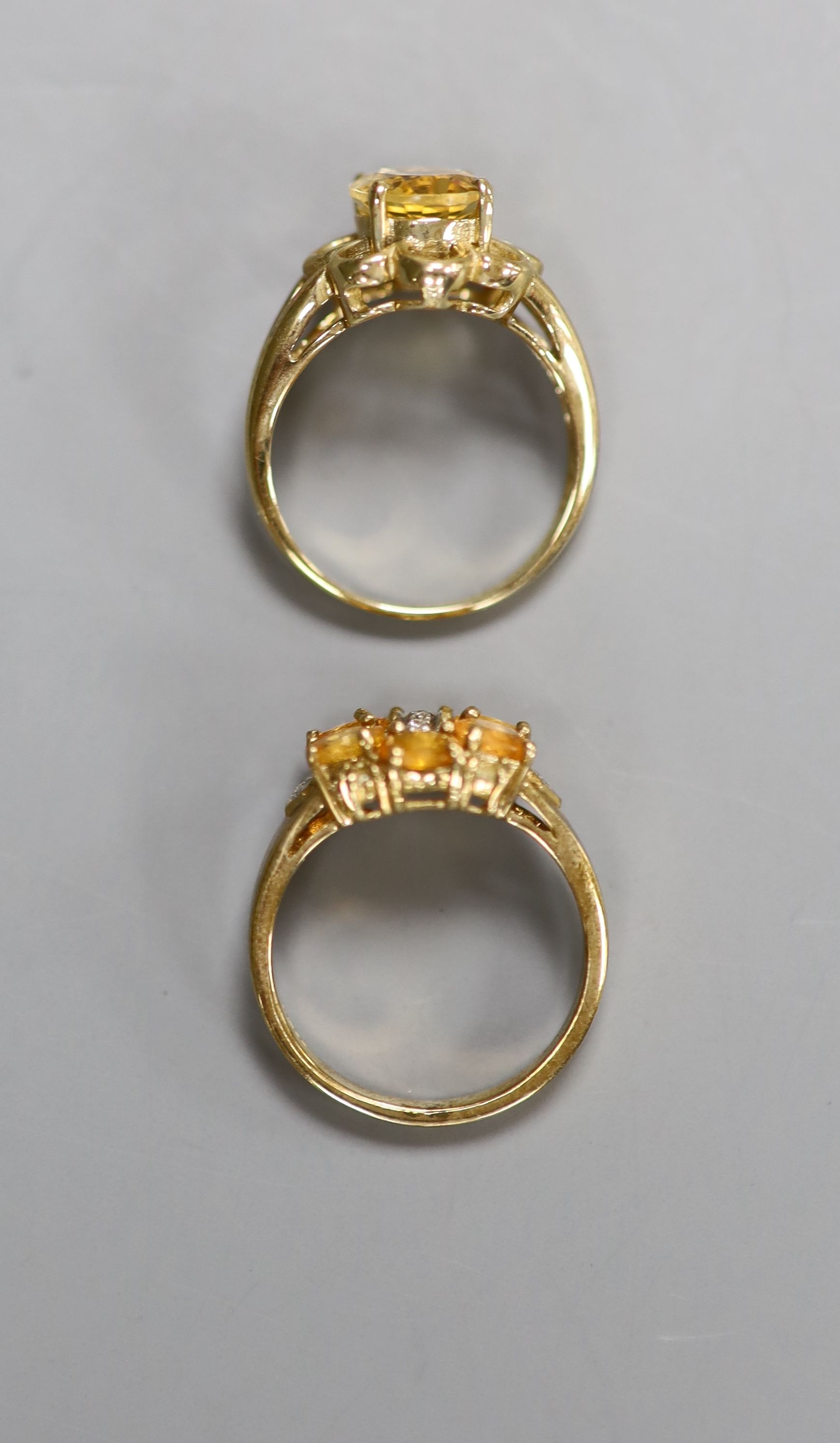 Two 9ct gold citrine set rings